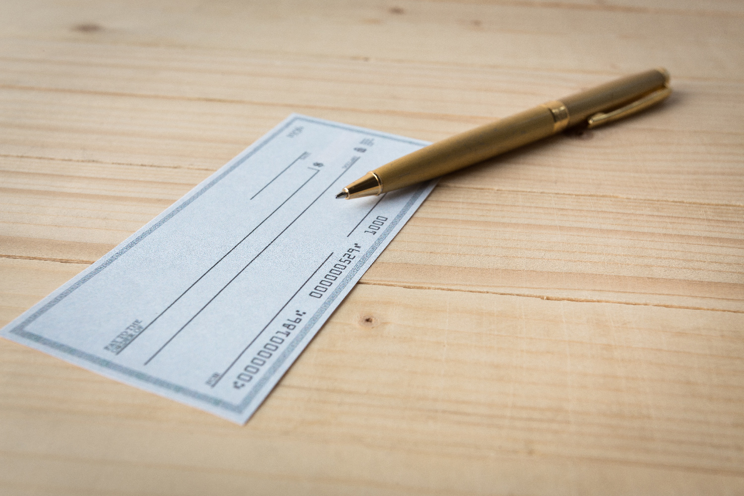 banking-check-and-pen Banking check and pen.